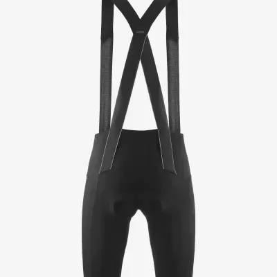 Calções de ciclismo pretos com alças cruzadas e reforço acolchoado.