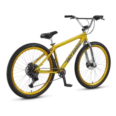 Bicicleta BMX amarela com rodas amarelas e pneus pretos, selim e guiador pretos