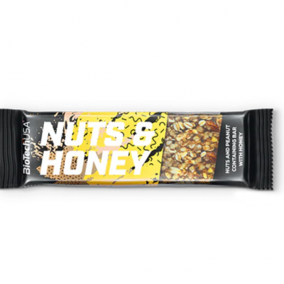 Barra alimentar Nuts & Honey com embalagem preta, amarela e branca
