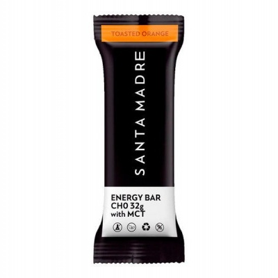 Barra energética Santa Madre com embalagem preta, detalhes laranja e branco texto 'TOASTED ORANGE' e 'ENERGY BAR CHO 32g with MCT'