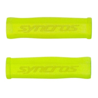 Punhos de bicicleta amarelos fluorescentes com texto Syncros