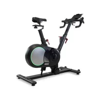 Bicicleta estática preta para exercício com detalhes verdes e vermelhos.