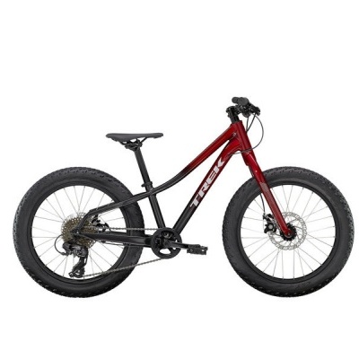 Bicicleta de montanha Trek vermelha e preta com pneus largos e travões a disco.