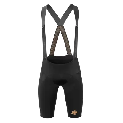 Calções de ciclismo pretos com alças e estampagem dourada.