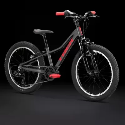 Bicicleta infantil preta com detalhes vermelhos e pneus pretos com borda branca