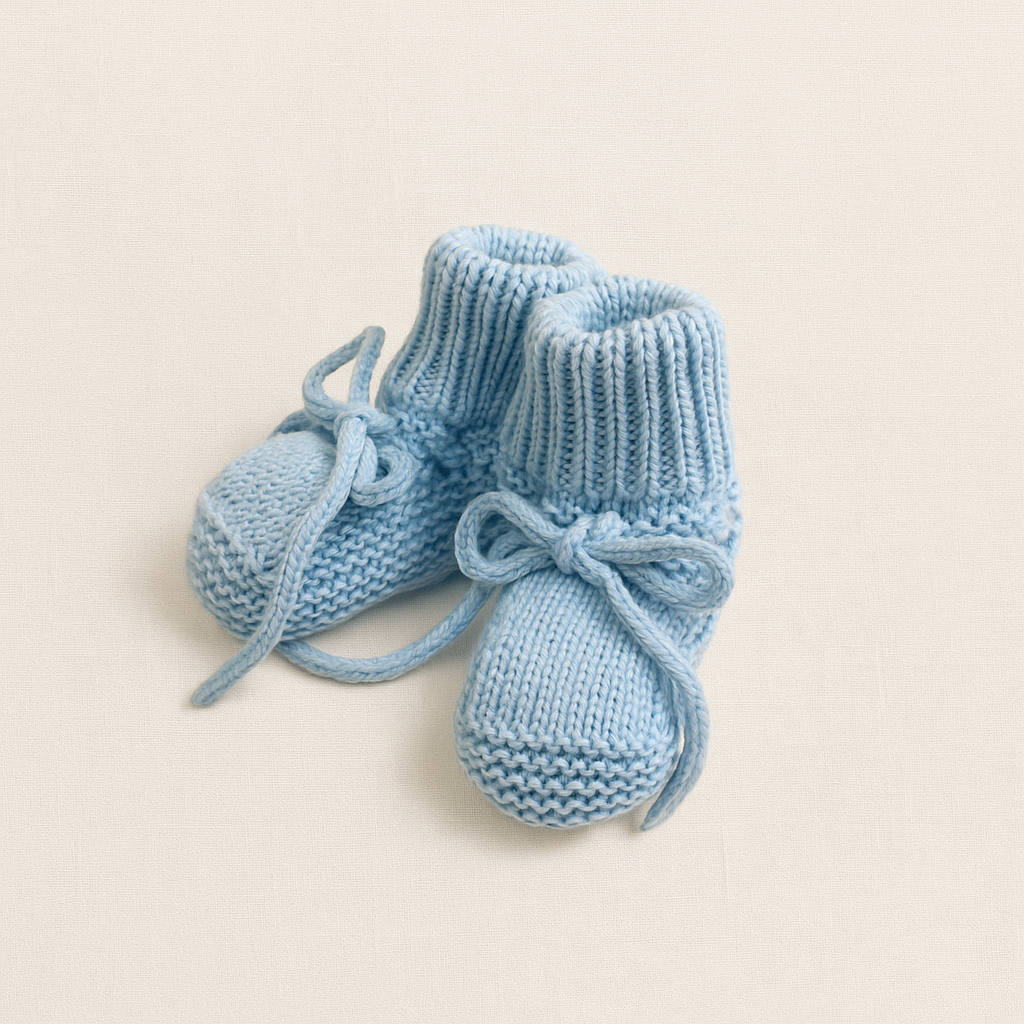 Botins de bebé azuis de malha com cadarço