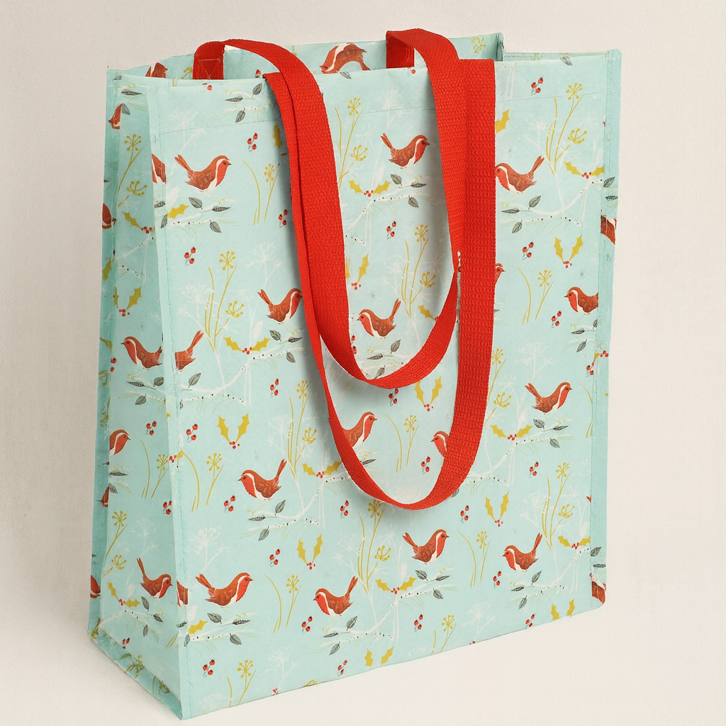Saco reutilizável azul com padrão de pássaros e alças vermelhas