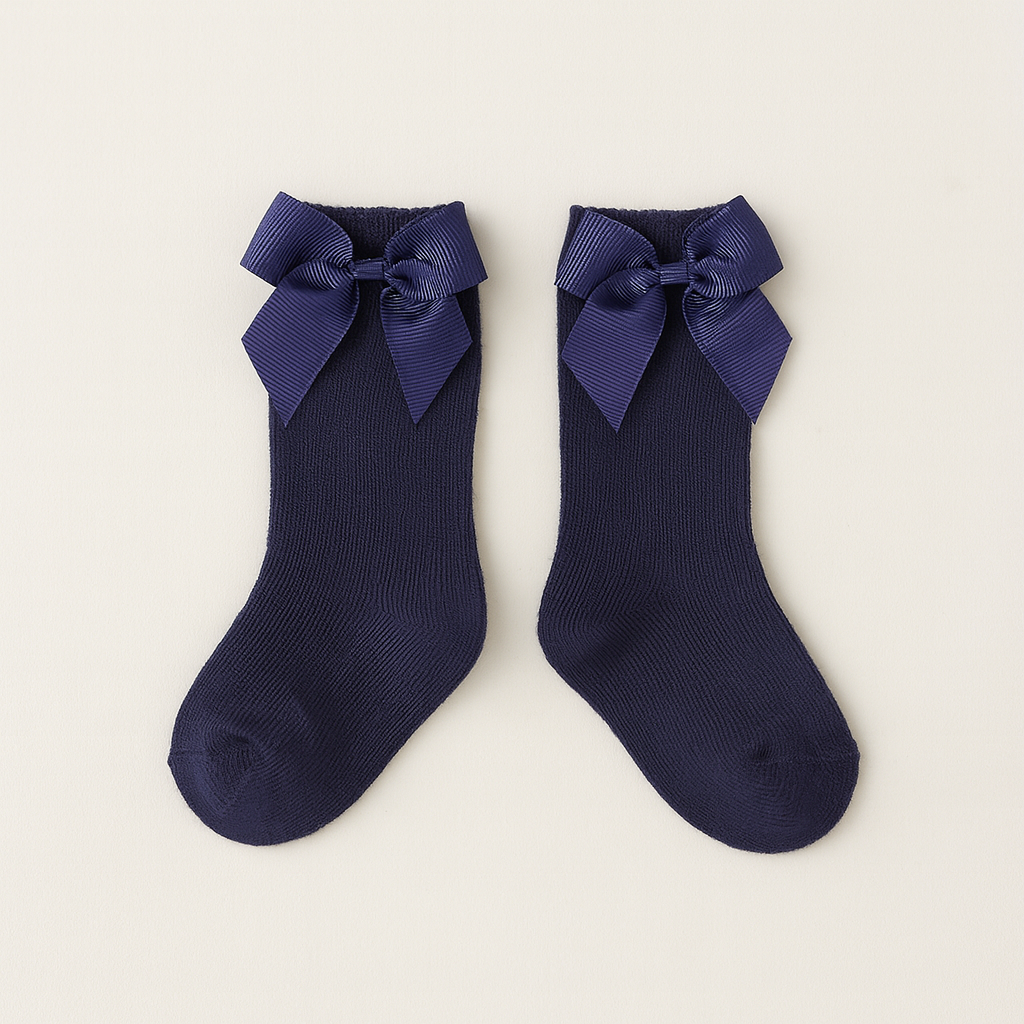 Meias infantis azuis-marinho com laços na parte superior