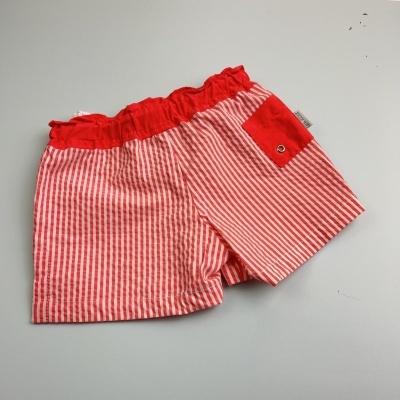Calções de criança listrados vermelhos e brancos com bolso vermelho