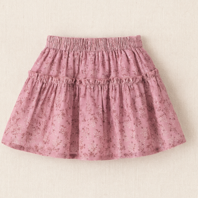 Saia infantil cor-de-rosa com padrão floral e cintura elástica