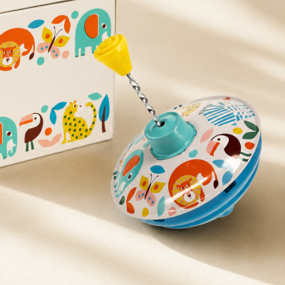 Pião colorido com desenhos de animais e caixa decorativa
