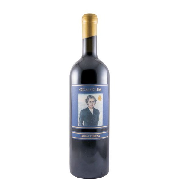 Guadelim Dona Teresa Grande Reserva tinto 2015 Garrafa de vinho Guadelim Doña Teresa com rótulo azul e imagem de mulher