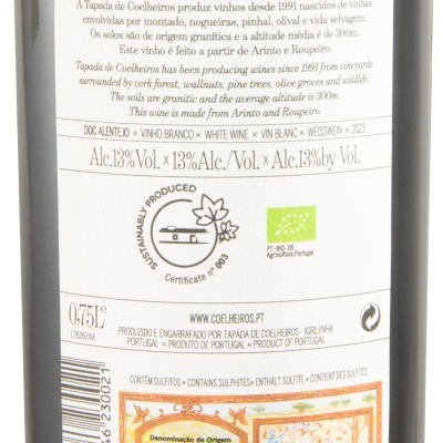 Rótulo traseiro de vinho branco Tapada de Coelheiros com informações sobre o vinho e certificações