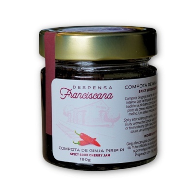 Frasco de compota de ginja piripiri com tampa dourada e rótulo branco