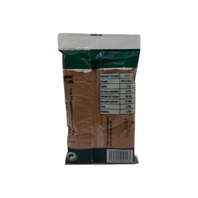 Pacote de pó castanho com tabela nutricional e código de barras.