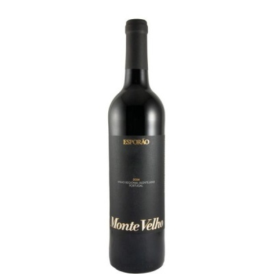 Garrafa de vinho tinto Monte Velho com rótulo preto e texto dourado