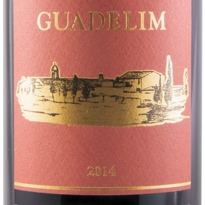 Garrafa de vinho GUADELIM 2014 Grande Reserva com rótulo vermelho e preto