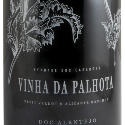 Rótulo de vinho preto com folhas brancas e texto