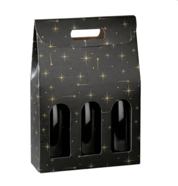 Caixa de embalagem preta com estrelas douradas e recortes frontais para garrafas