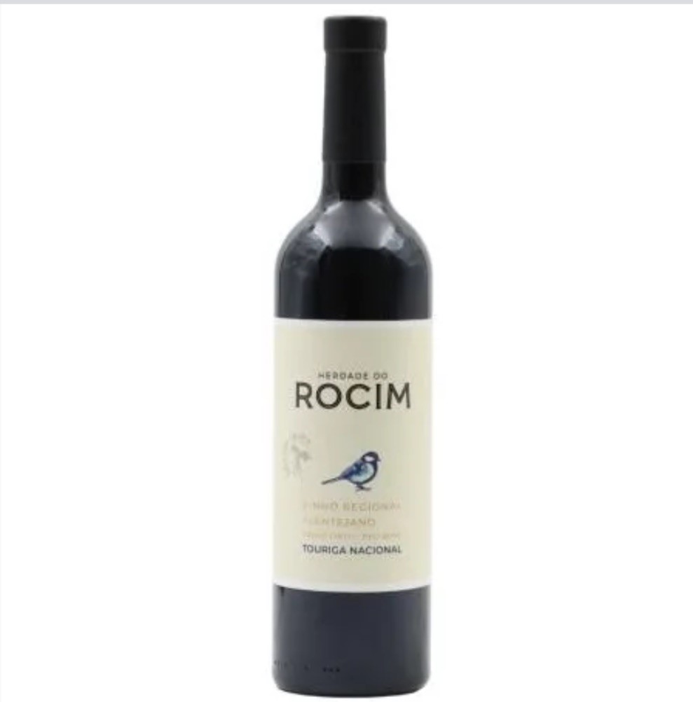 Garrafa de vinho tinto com rótulo creme e pássaro azul