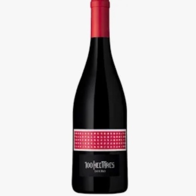 Garrafa de vinho tinto com tampa e rótulos vermelhos e pretos