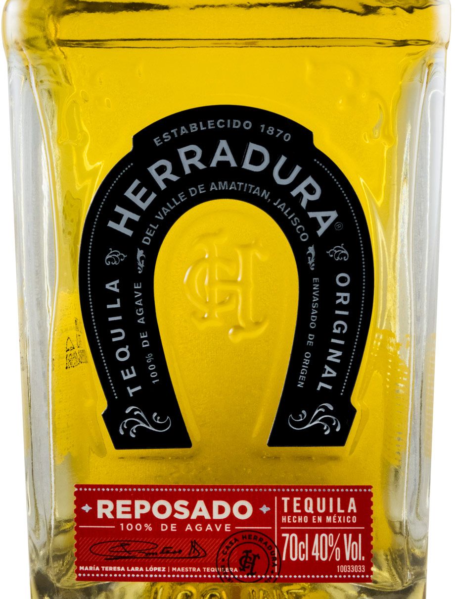 Tequila Herradura Reposado Garrafa de tequila Reposado Herradura com rótulo preto e vermelho