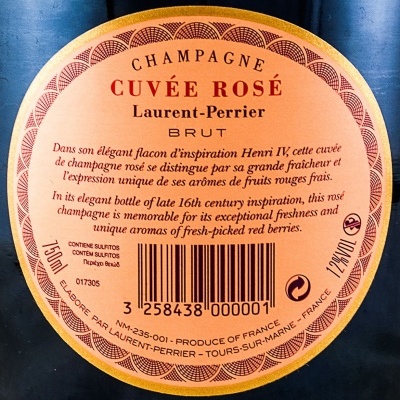 Etiqueta circular rosa de champanhe Cuvée Rosé Laurent-Perrier com texto descritivo e código de barras