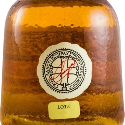 Frasco de vidro âmbar com rótulo e autocolante amarelo com a palavra LOTE