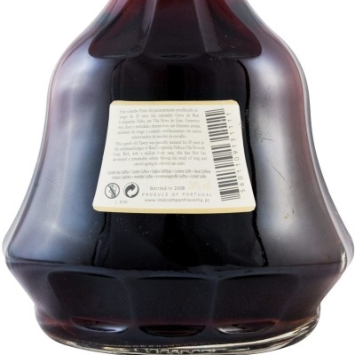 Garrafa de vidro escuro com etiqueta traseira e código de barras