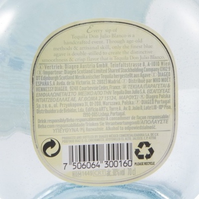 Etiqueta redonda na base de garrafa de vidro com texto e código de barras