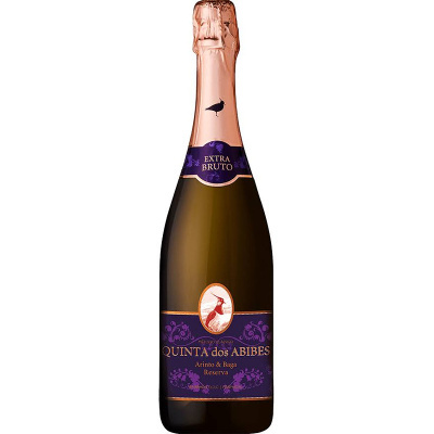 Garrafa de espumante com rótulo roxo e dourado e selo com ave