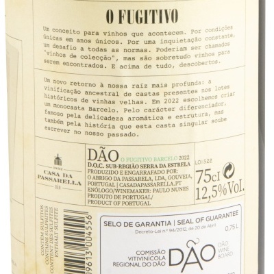 Rótulo traseiro de garrafa de vinho O Fugitivo com texto explicativo e informações técnicas.