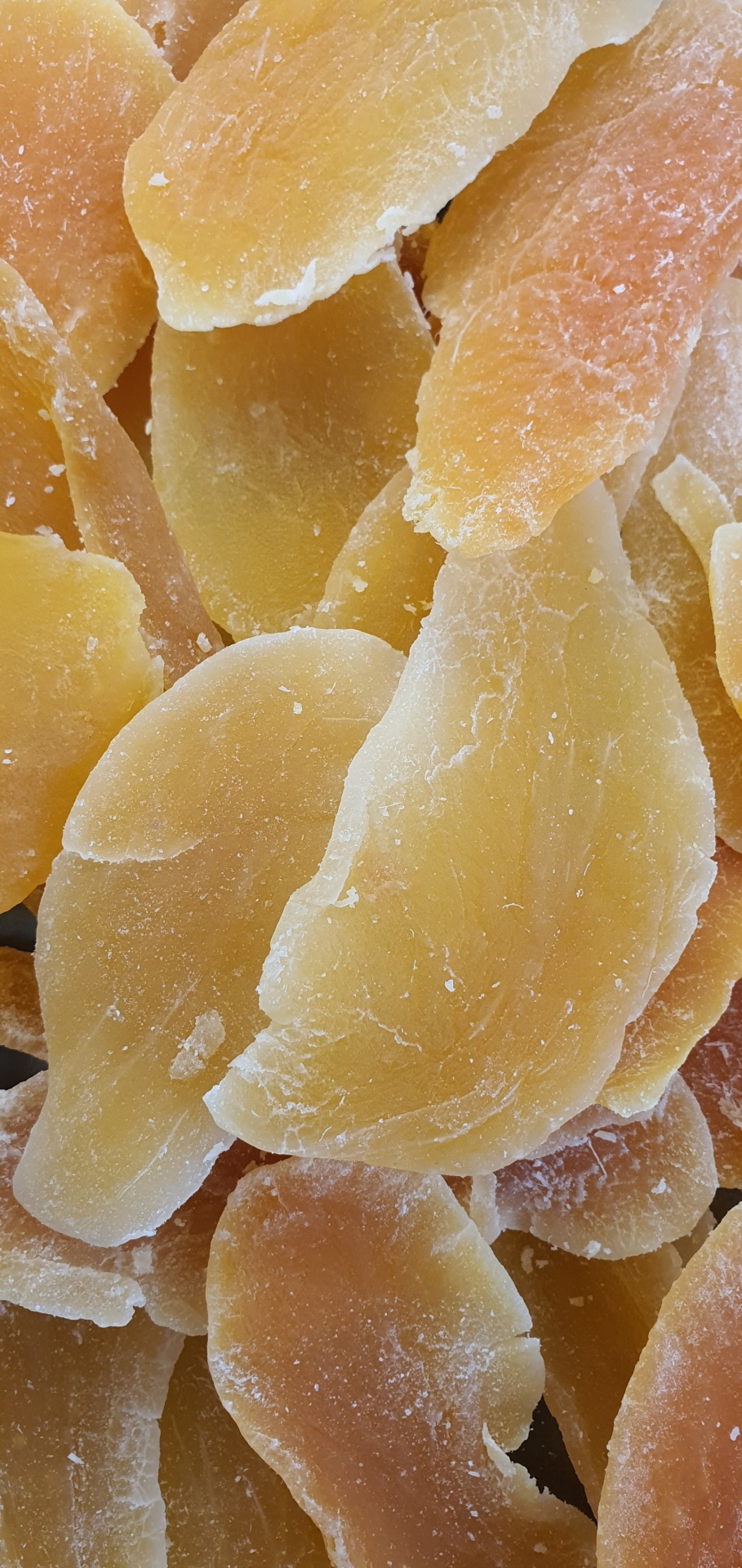 Fatias de manga seca com acabamento açúcar cristalizado