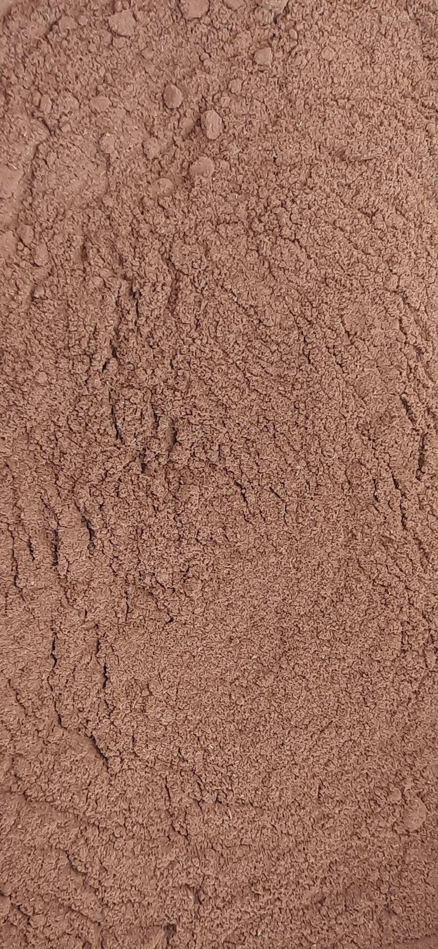 Tecido castanho felpudo com textura irregular