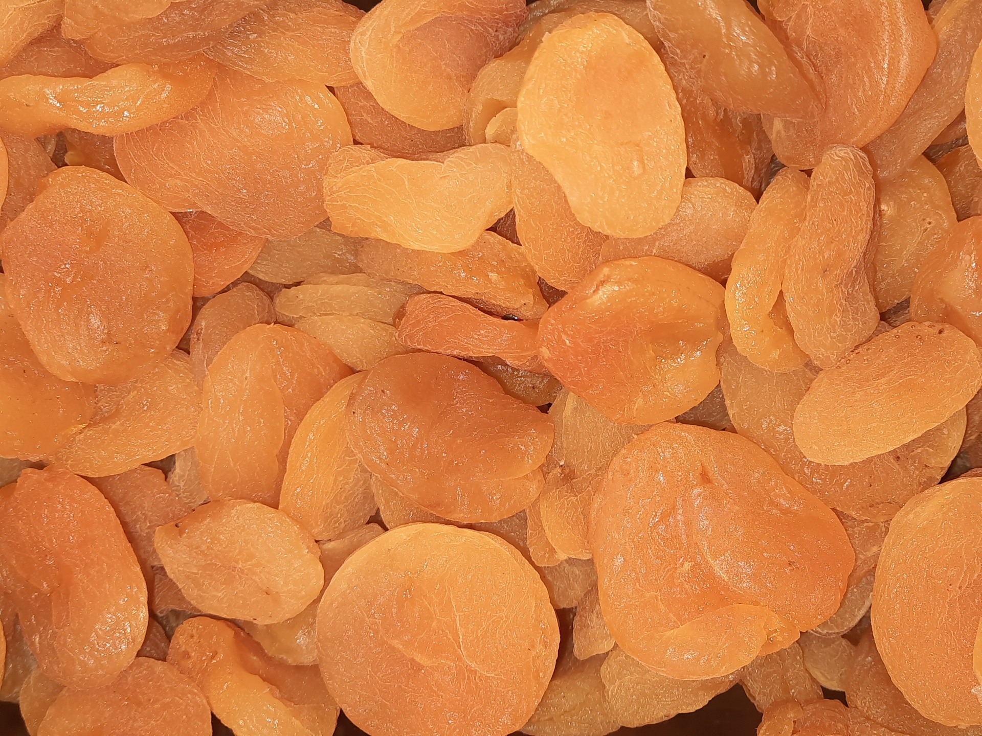 Damascos secos alaranjados empilhados