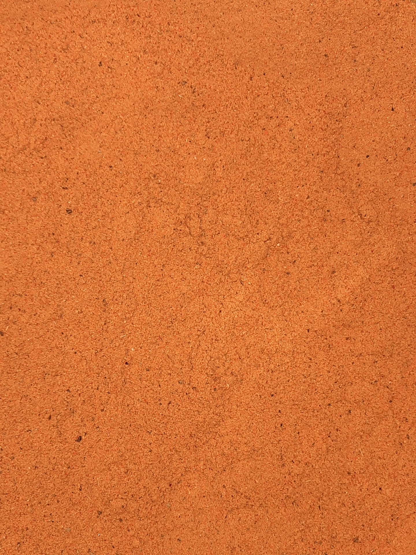 Superfície texturizada fina laranja acastanhada tipo areia