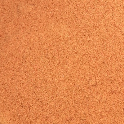 Superfície granulada laranja-queimado em textura fina