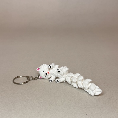 Porta-chaves com figura de gato branco e detalhes em preto e rosa