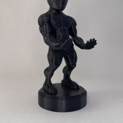 Figura de ação preta Spider-Man com base redonda.
