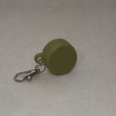 Chaveiro verde com clip metálico prateado