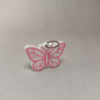 Chaveiro borboleta branco e rosa com argola metálica prateada