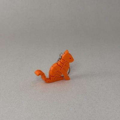 Figuras articuladas de lagarto em plástico laranja com corrente