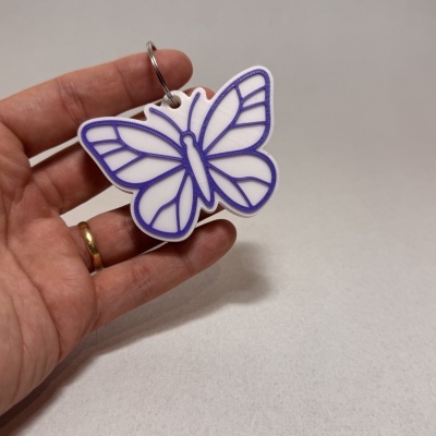 porta-chaves borboleta branco com detalhes violeta