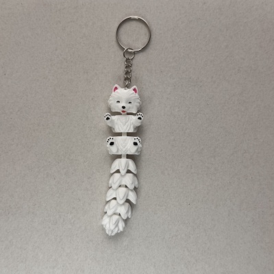 Porta-chaves com figura branca de cão segmentado e argola metálica
