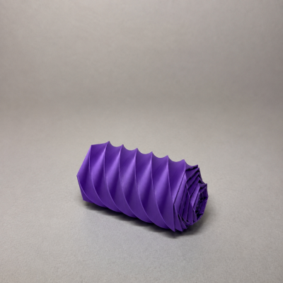 Objeto cilíndrico roxo com textura em espiral