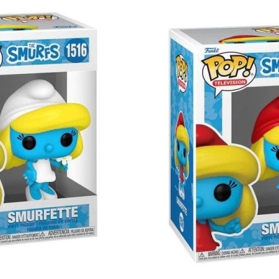 Duas figuras colecionáveis Funko Pop! Smurfette, uma com chapéu branco e outra com chapéu vermelho dentro das respetivas caixas.