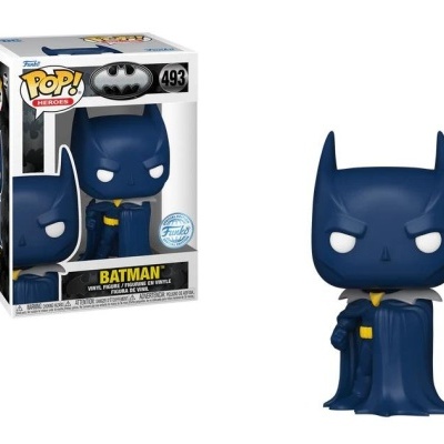 Figura Funko Pop de vinil do Batman com máscara e capa azul ao lado da embalagem