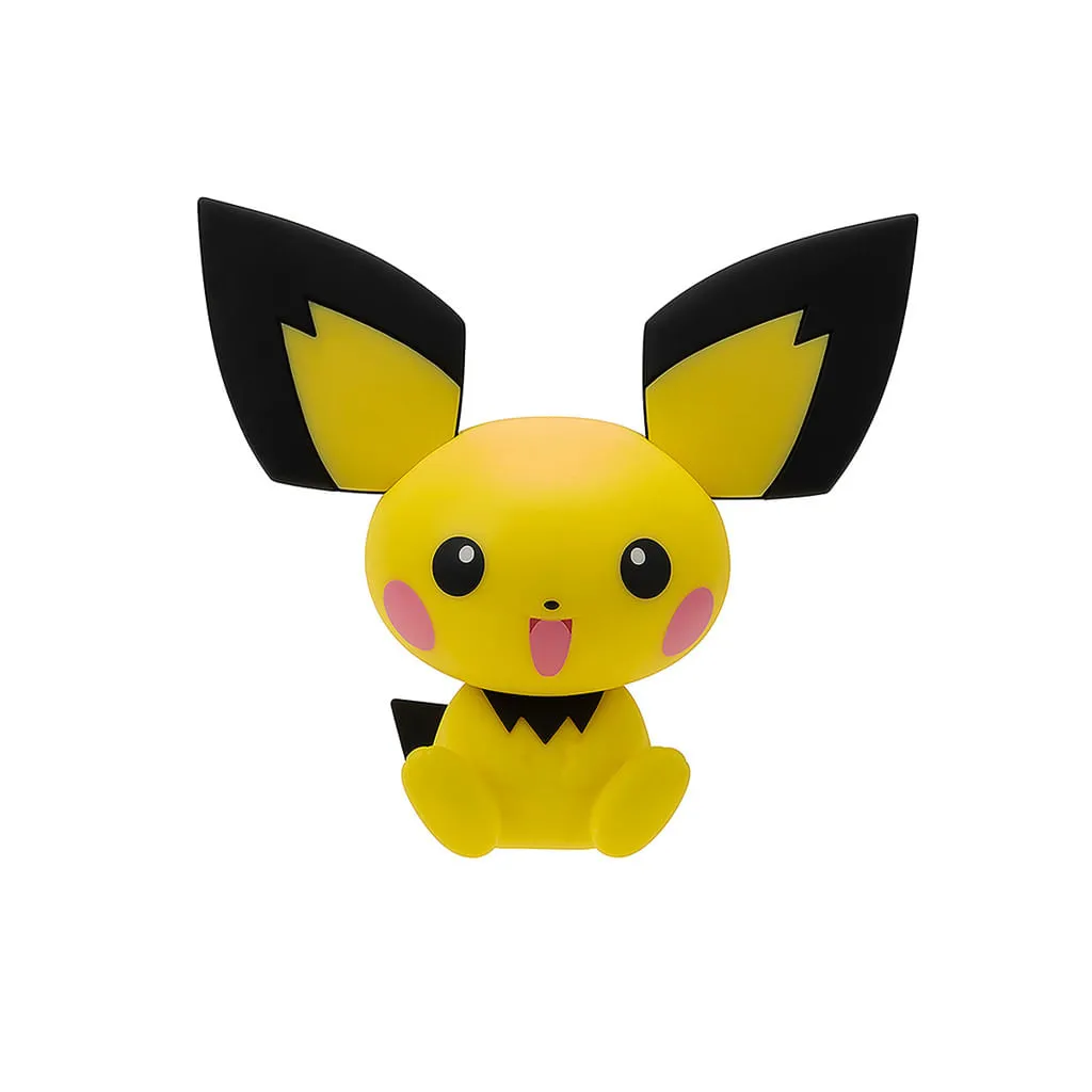 Figura de brinquedo amarela com orelhas grandes preto e amarelas