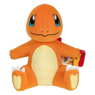 Pelúcia do personagem Charmander com barriga amarela e olhos azuis