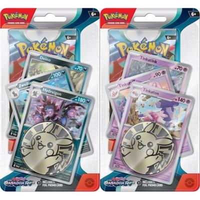 Dois packs de cartas Pokémon com moedas douradas e várias cartas à vista